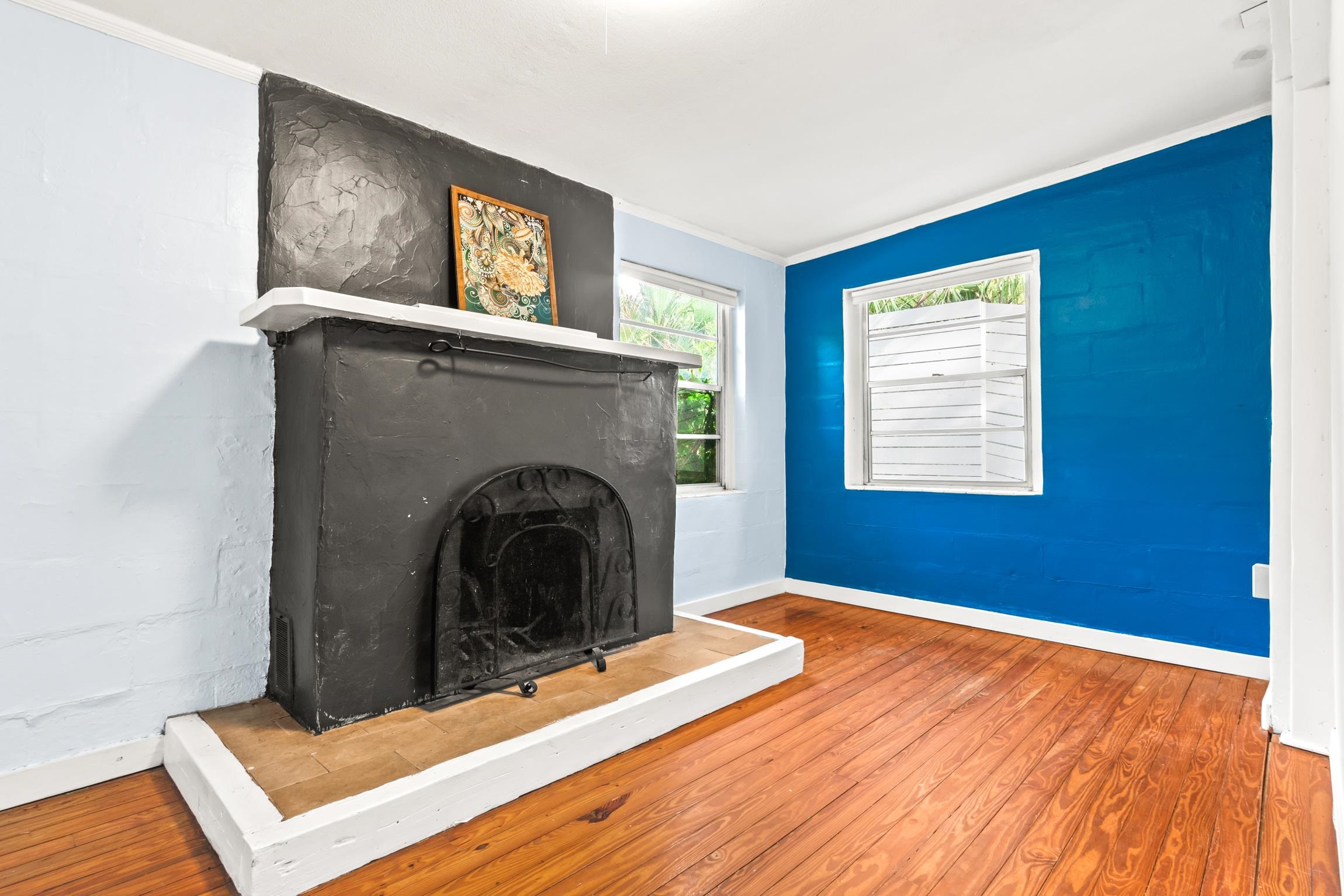 26 Ponce De Leon Avenue St. Augustine, FL 32080 - Photo 4 of 51 a view of a livingroom with an empty space and a fireplace