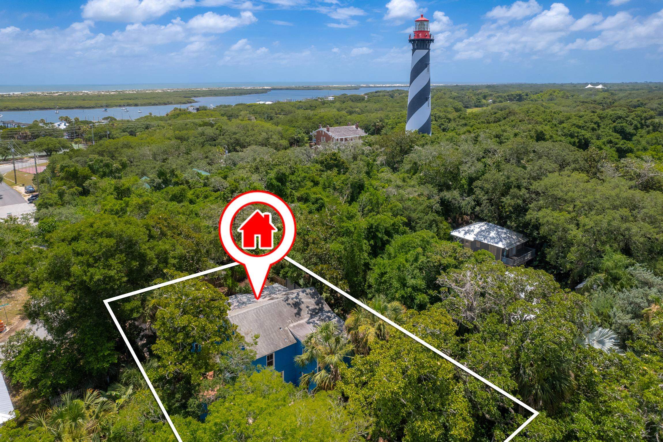 26 Ponce De Leon Avenue St. Augustine, FL 32080 - Photo 50 of 51 a view of a outdoor space with signage and flags