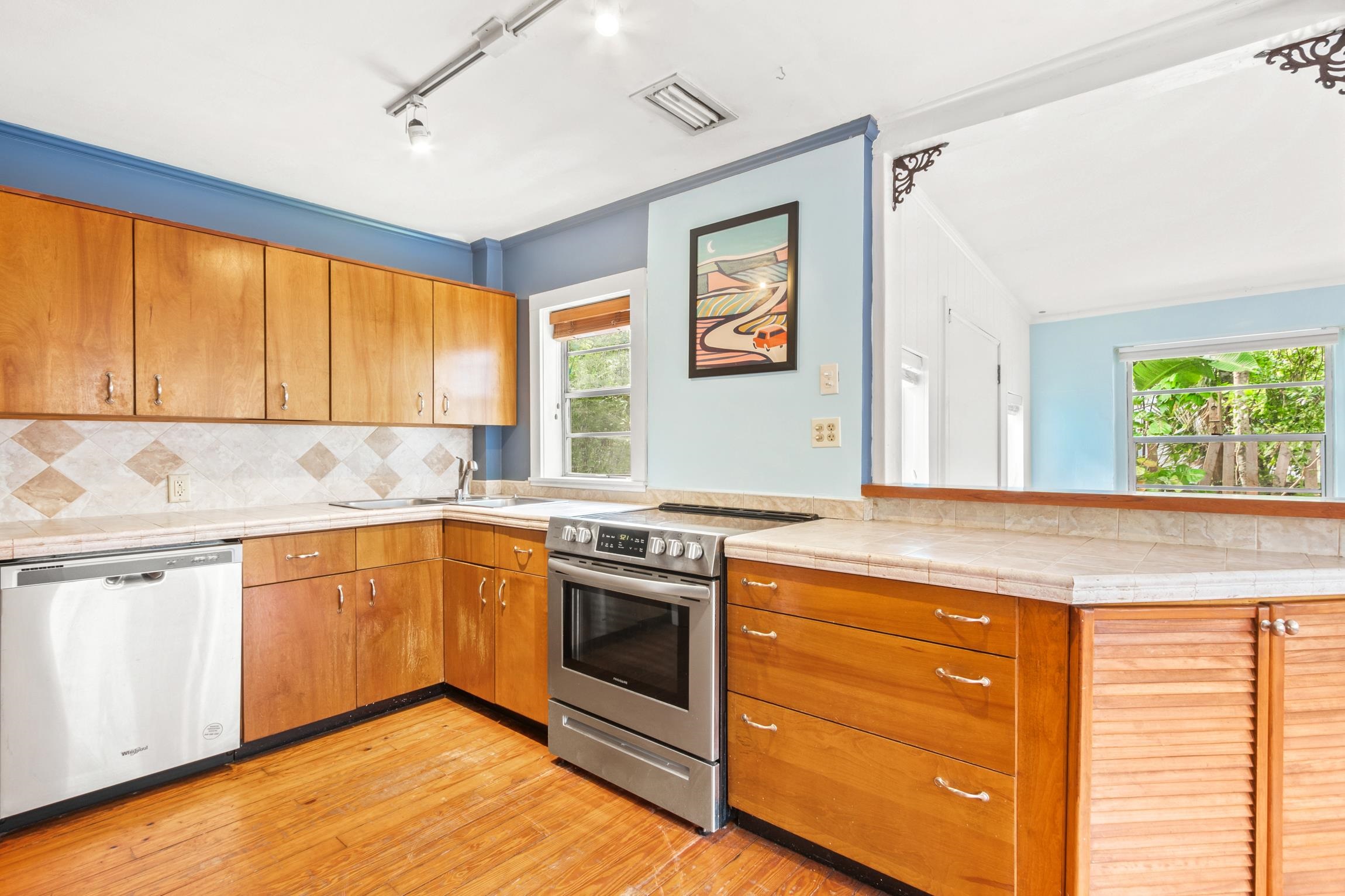 26 Ponce De Leon Avenue St. Augustine, FL 32080 - Photo 7 of 51 a kitchen with stainless steel appliances granite countertop a stove and a sink
