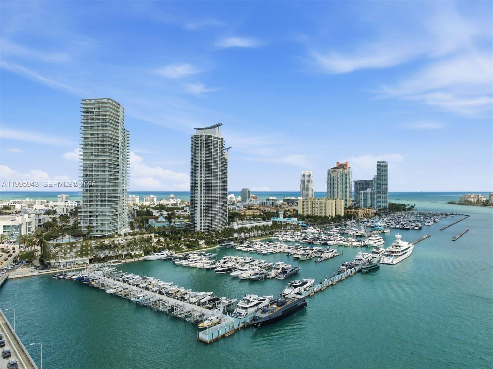 450 Alton Road, Unit 910 Miami Beach, FL 33139 - Photo 42 of 59 a view of a city with tall buildings