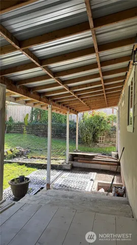 a view of backyard with cabin