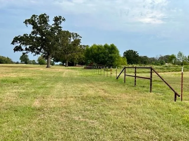 a view of a golf course with a lake