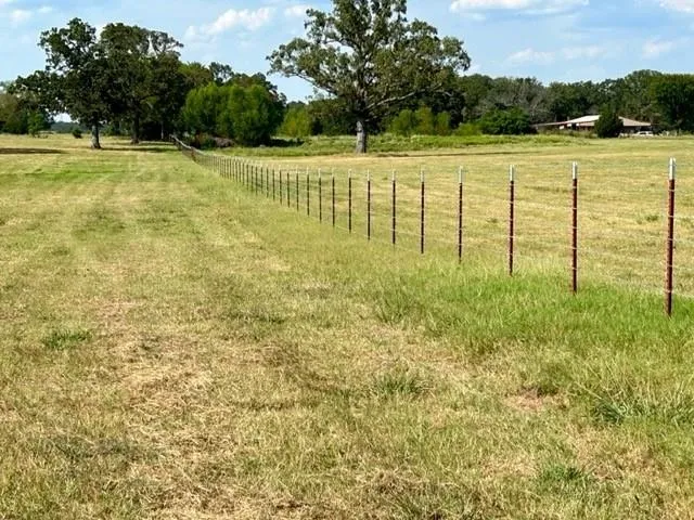 a view of swimming pool with an outdoor space and seating area