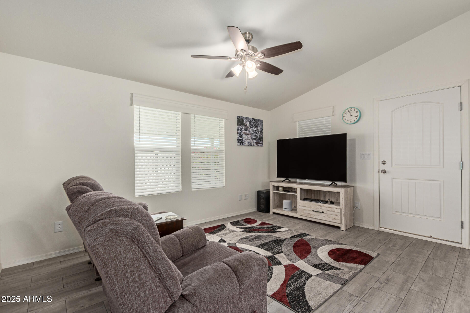 10540 East Apache Trail, Unit 50 Apache Junction, AZ 85120 - Photo 13 of 32 a living room with furniture and a flat screen tv