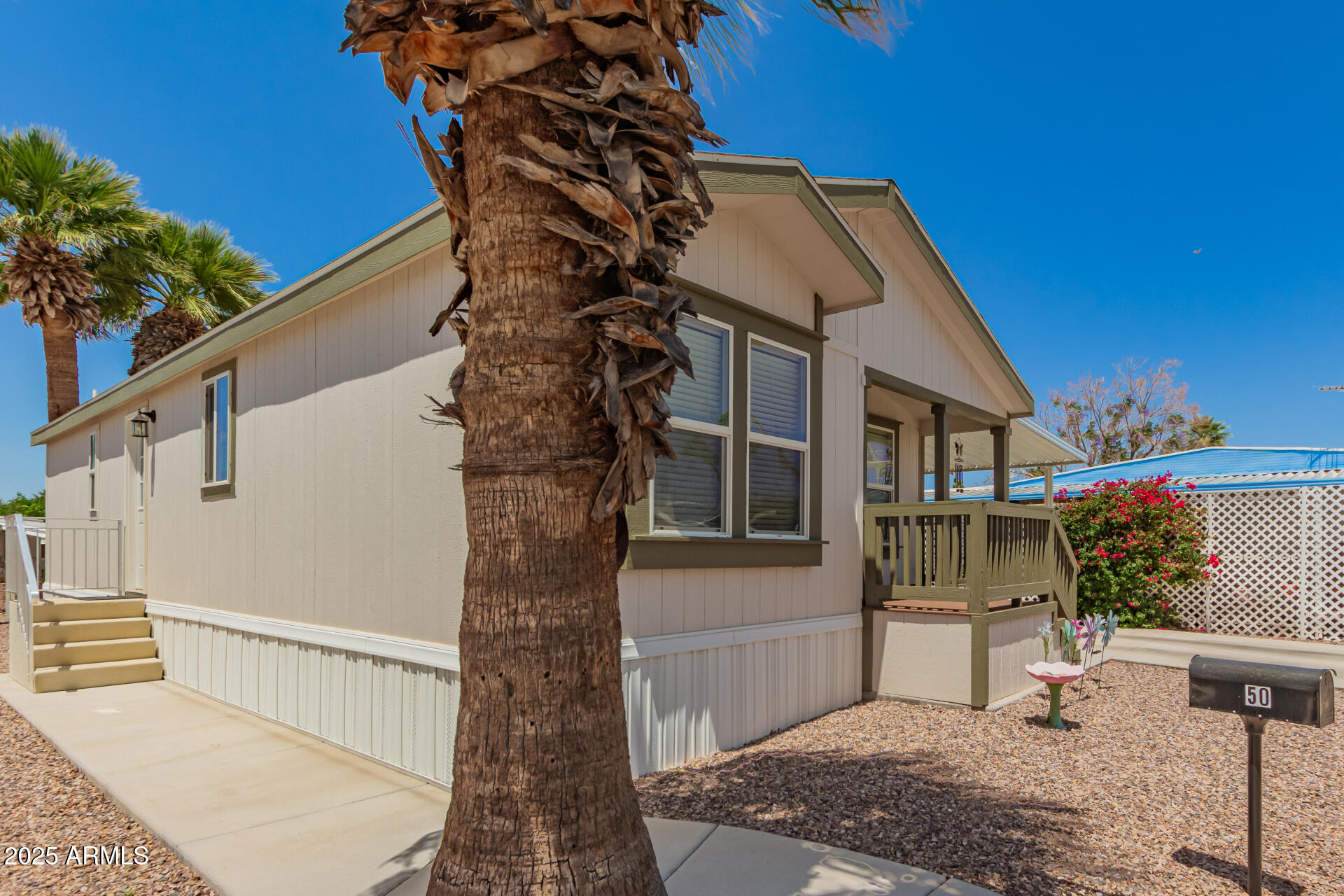 10540 East Apache Trail, Unit 50 Apache Junction, AZ 85120 - Photo 7 of 32 a house view with a outdoor space