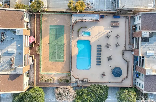 a view of a swimming pool with a patio
