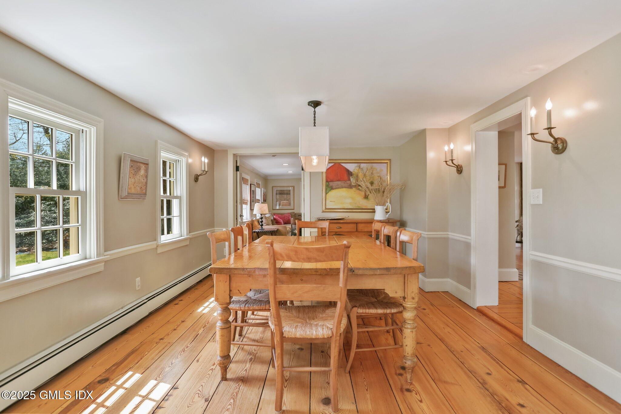 1007 King Street Greenwich, CT 06831 - Photo 14 of 71 a view of a dining room with furniture window and wooden floor