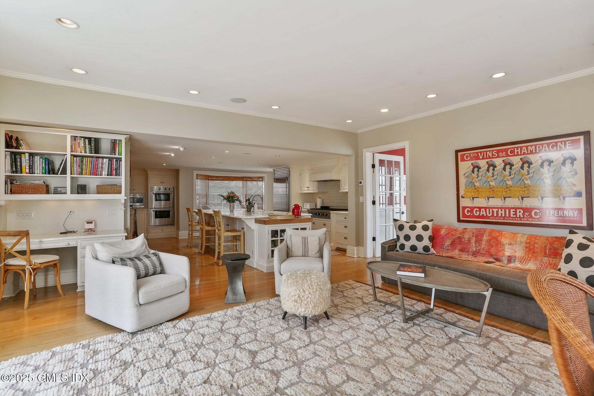 1007 King Street Greenwich, CT 06831 - Photo 22 of 71 a living room with furniture and a rug
