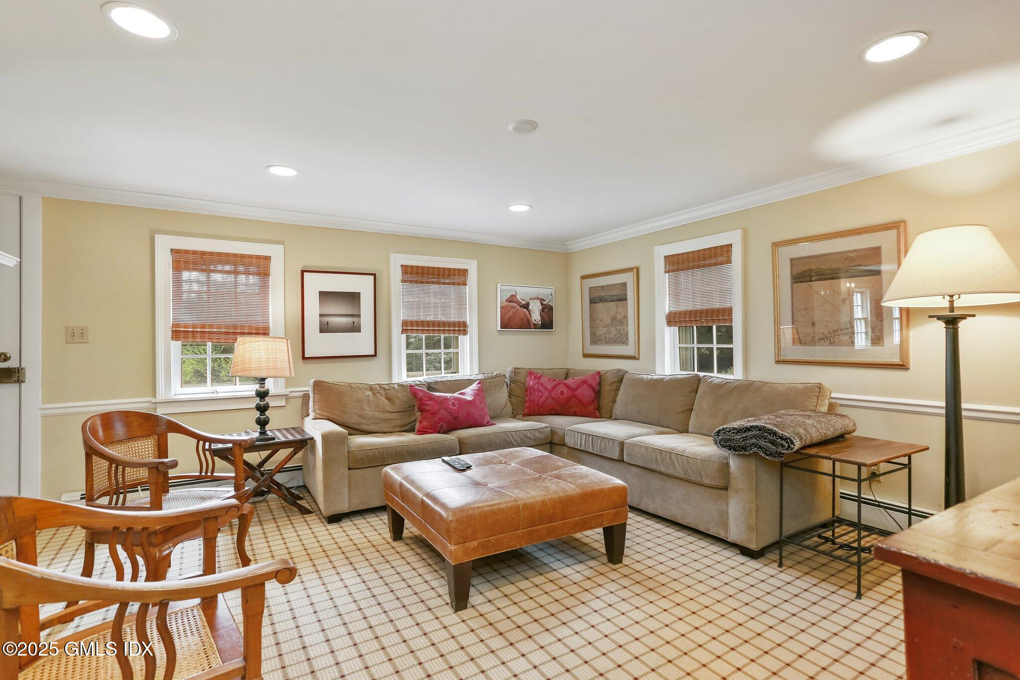 1007 King Street Greenwich, CT 06831 - Photo 7 of 71 a living room with furniture and a window