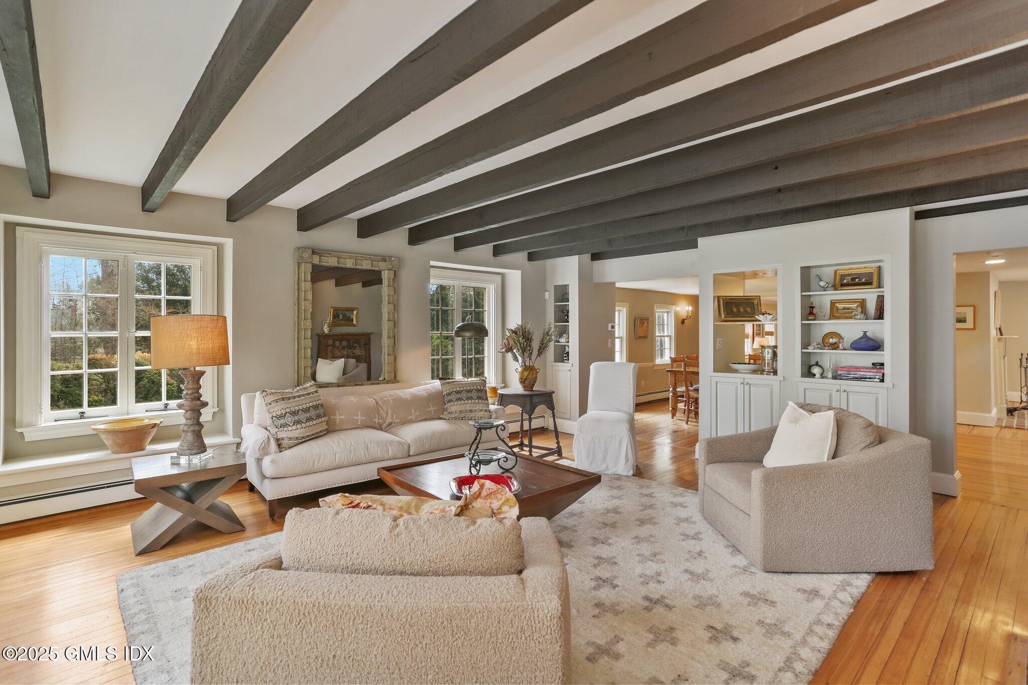 1007 King Street Greenwich, CT 06831 - Photo 10 of 71 a living room with furniture and a large window