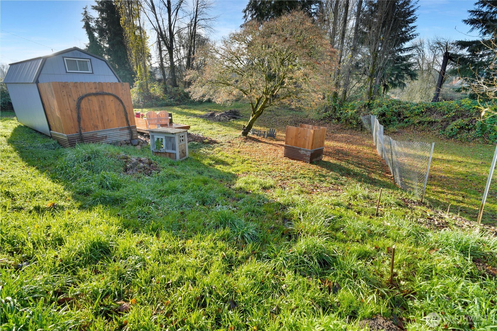 115 Bunker Creek Road Chehalis, WA 98532 - Photo 11 of 17 a backyard of a house with lots of green space and fountain