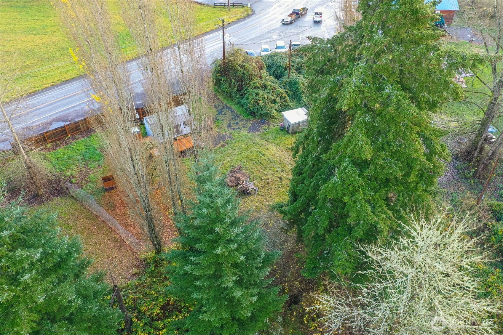115 Bunker Creek Road Chehalis, WA 98532 - Photo 16 of 17 a backyard of a house with a yard and outdoor seating