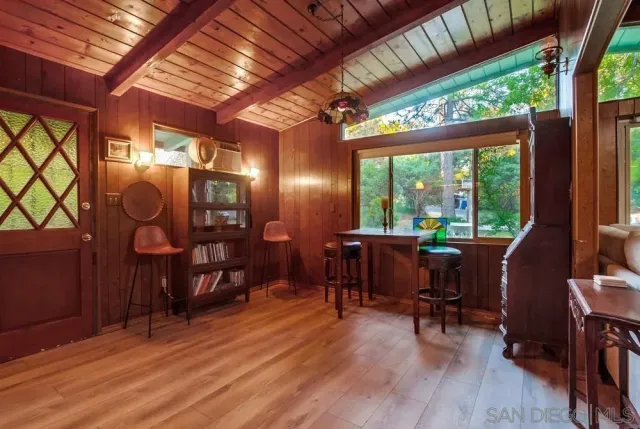 a view of a livingroom with furniture window and outside view