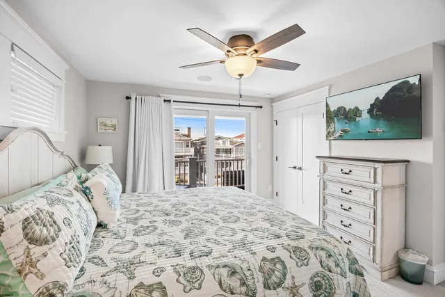 a bathroom with a double vanity sink toilet and shower