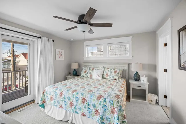 a bathroom with a granite countertop toilet sink and mirror