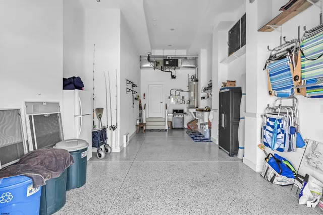 a front view of a building with a yard