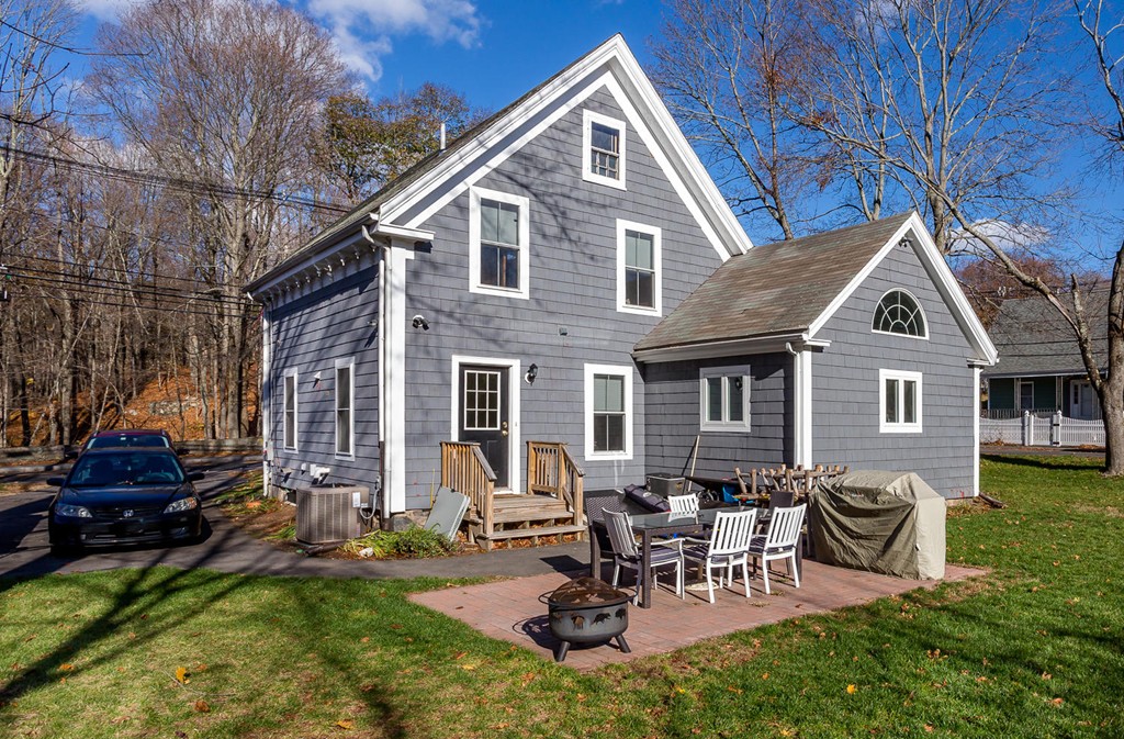 136 Sherman Street Canton, MA 02021 - Photo 17 of 17 a front view of a house with patio