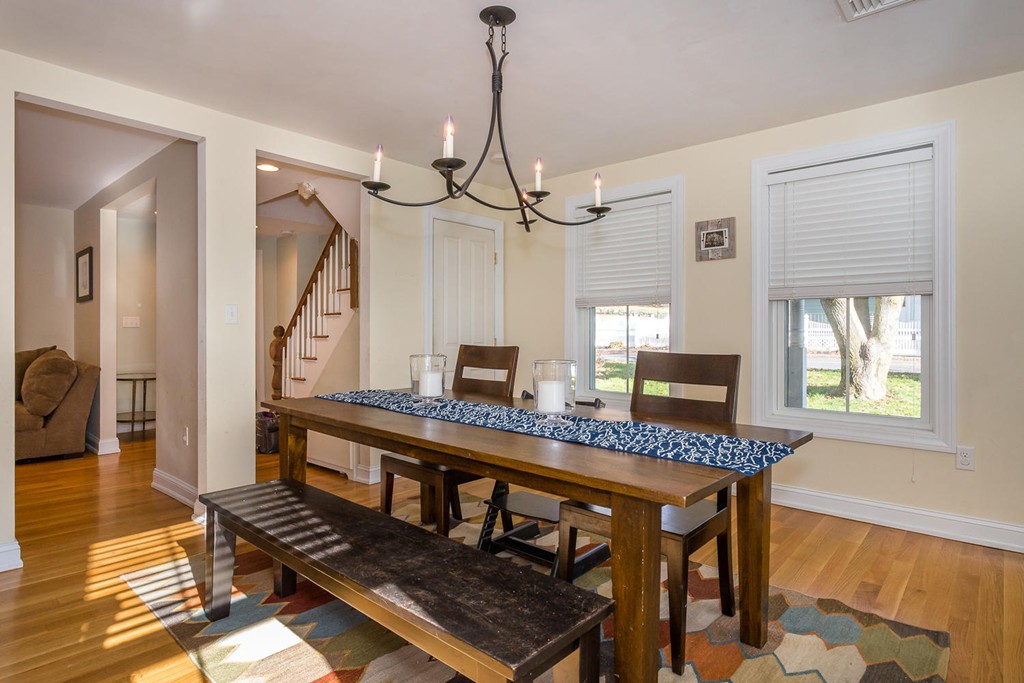 136 Sherman Street Canton, MA 02021 - Photo 4 of 17 a view of a dining room with furniture window and wooden floor