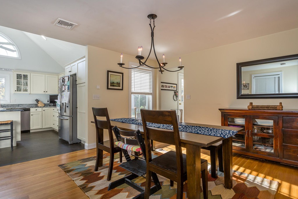 136 Sherman Street Canton, MA 02021 - Photo 5 of 17 a view of a dining room with furniture and wooden floor