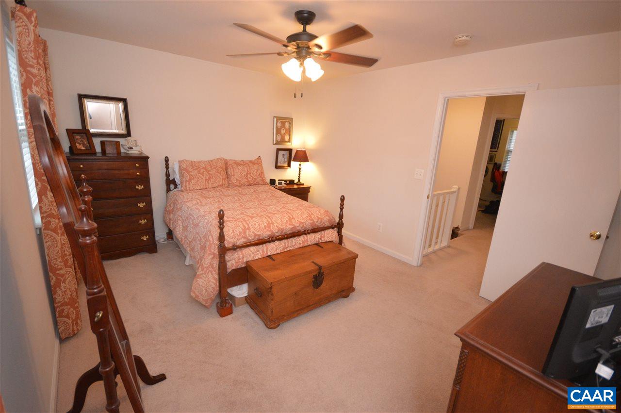 1574 Cool Spring Road Charlottesville, VA 22901 - Photo 14 of 23 a bedroom with furniture and a flat screen tv