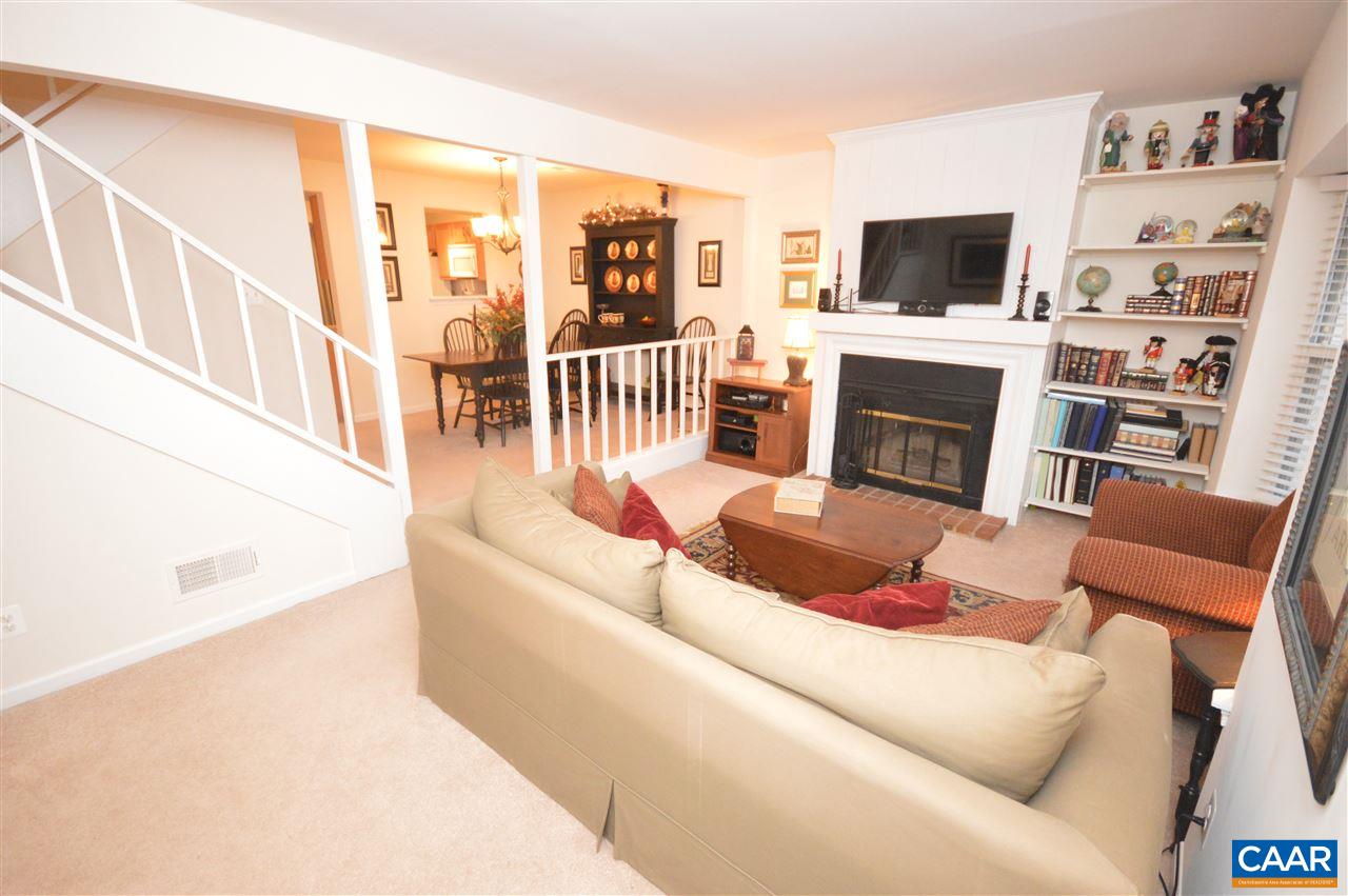 1574 Cool Spring Road Charlottesville, VA 22901 - Photo 4 of 23 a living room with furniture a flat screen tv and a fireplace