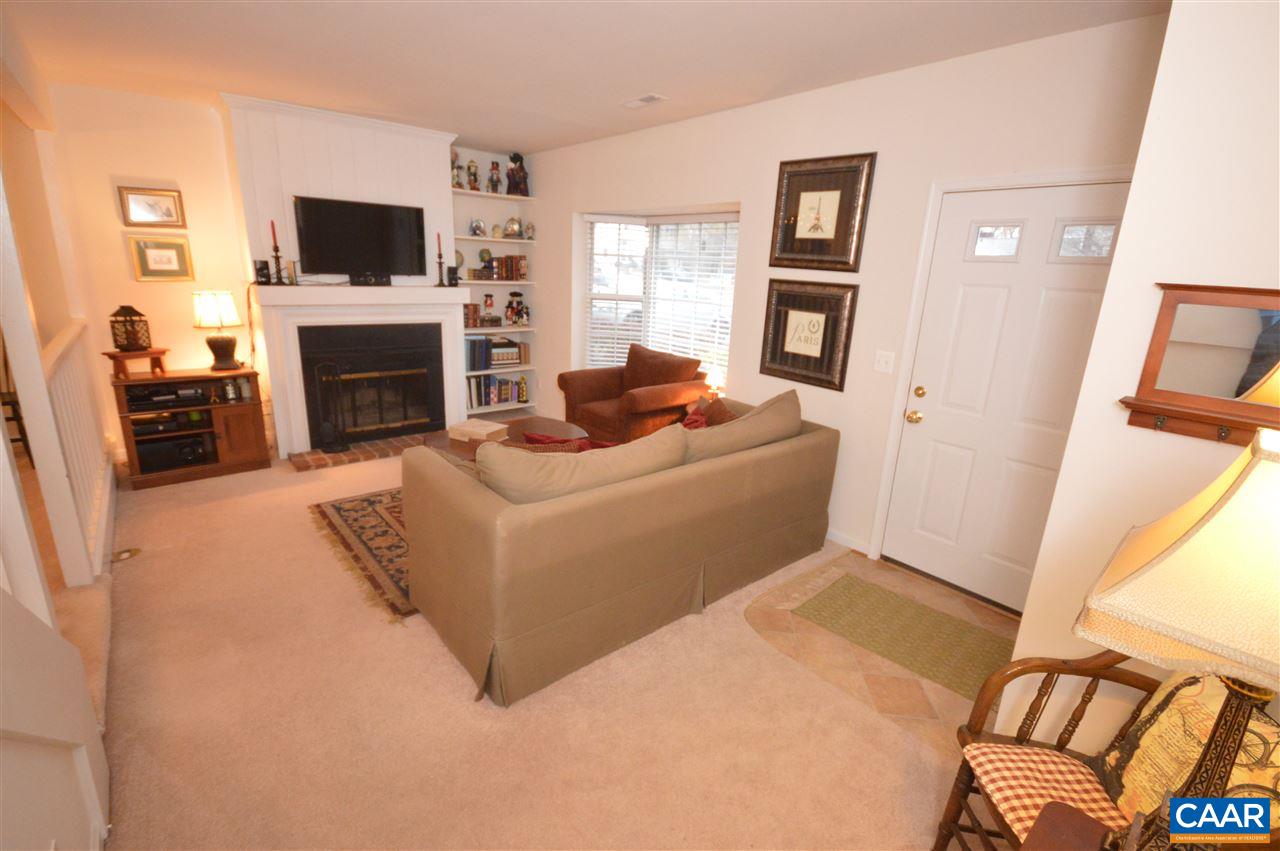 1574 Cool Spring Road Charlottesville, VA 22901 - Photo 5 of 23 a living room with furniture a flat screen tv and a fireplace