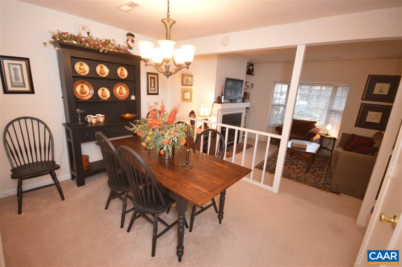 1574 Cool Spring Road Charlottesville, VA 22901 - Photo 8 of 23 a view of a dining room with furniture wooden floor and chandelier