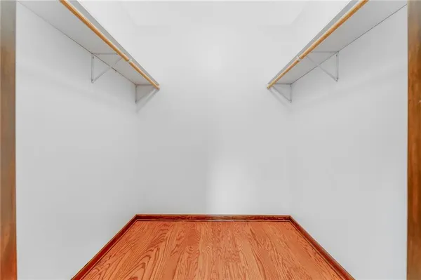 a view of a room with racks on the wall