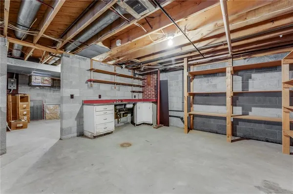 a view of storage and utility room