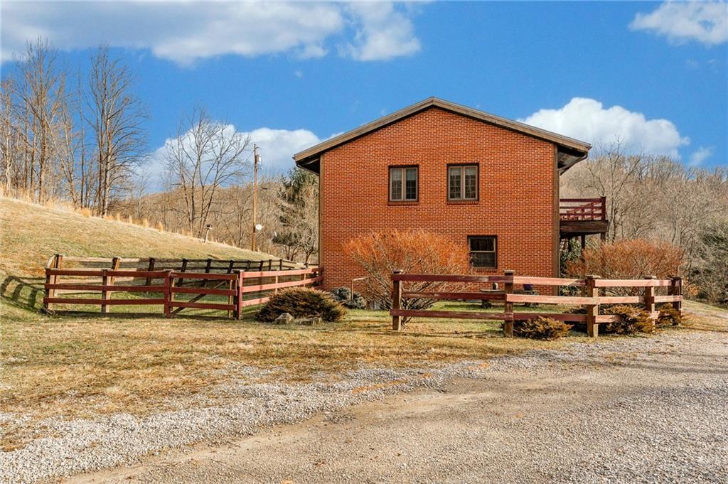 264 Stewart Run Road Waynesburg, PA 15370 - Photo 45 of 50 a view of a house with a yard