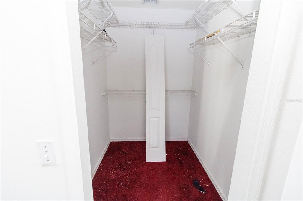 11339 Dean Street Spring Hill, FL 34608 - Photo 16 of 33 a view of walk in closet