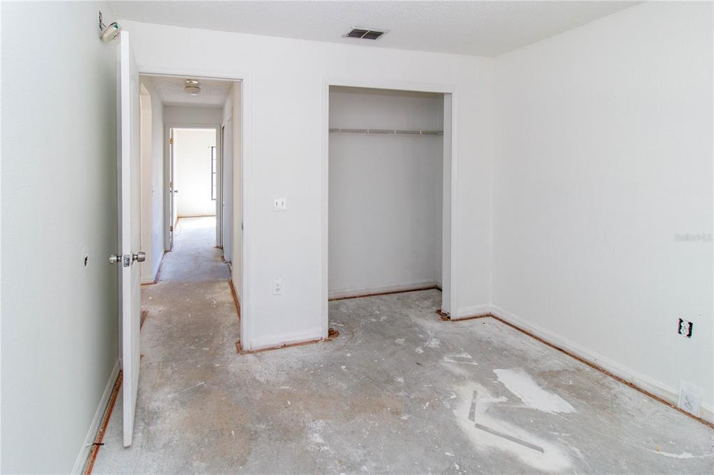 11339 Dean Street Spring Hill, FL 34608 - Photo 19 of 33 an empty room with a bathroom