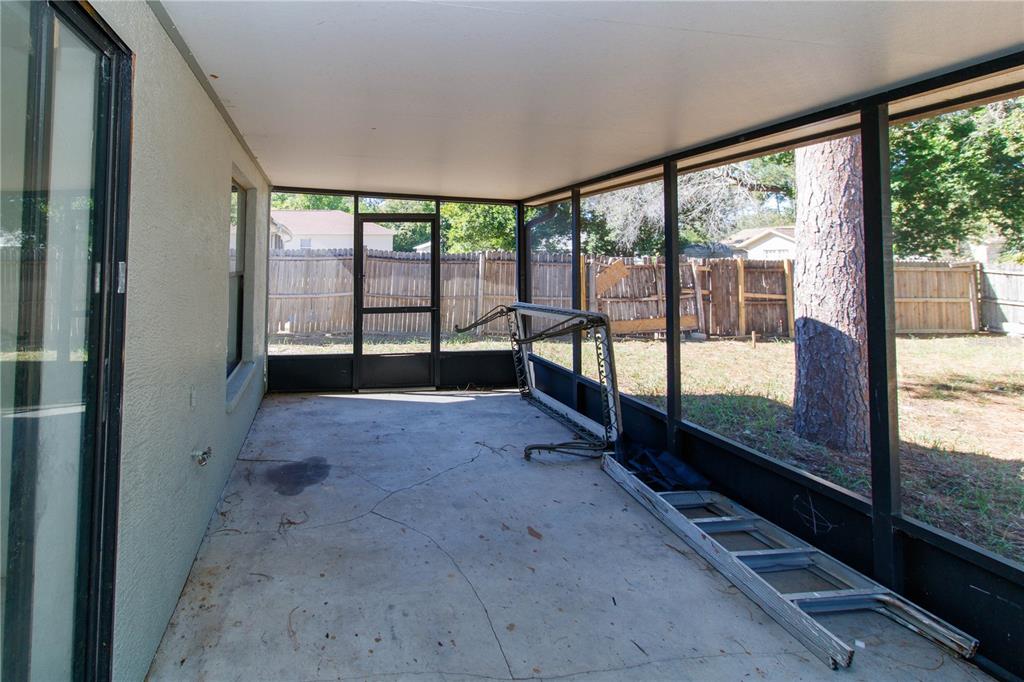 11339 Dean Street Spring Hill, FL 34608 - Photo 28 of 33 a view of a room with an empty space and balcony