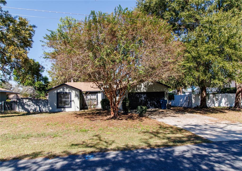 11339 Dean Street Spring Hill, FL 34608 - Photo 33 of 33 a view of a house with a yard covered in snow