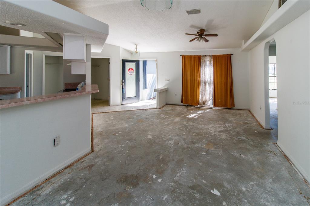 11339 Dean Street Spring Hill, FL 34608 - Photo 7 of 33 a view of an empty room with a window