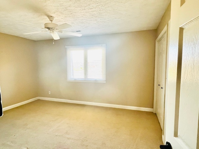 323 South Towanda Avenue, Unit 4 Normal, IL 61761 - Photo 13 of 33 an empty room with a window