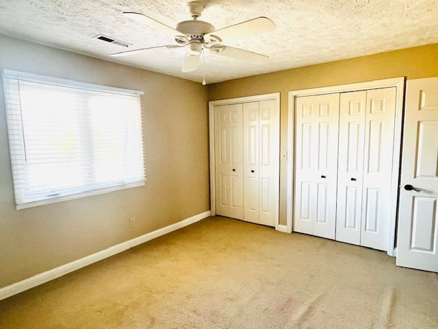 323 South Towanda Avenue, Unit 4 Normal, IL 61761 - Photo 14 of 33 a view of an empty room with a window