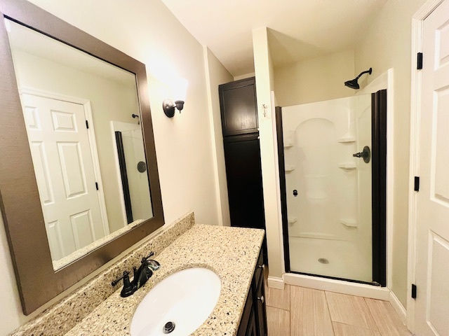 323 South Towanda Avenue, Unit 4 Normal, IL 61761 - Photo 15 of 33 a bathroom with a tub and a sink