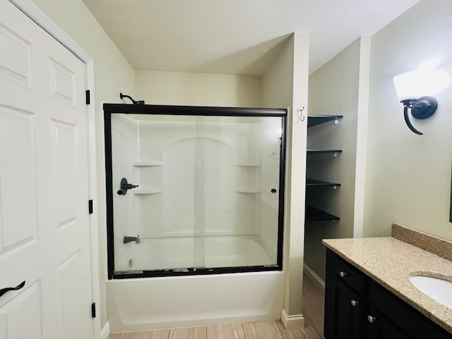 323 South Towanda Avenue, Unit 4 Normal, IL 61761 - Photo 22 of 33 a bathroom with a shower and a sink