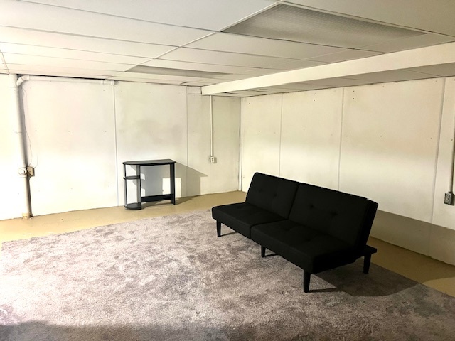 323 South Towanda Avenue, Unit 4 Normal, IL 61761 - Photo 24 of 33 a living room with a couch