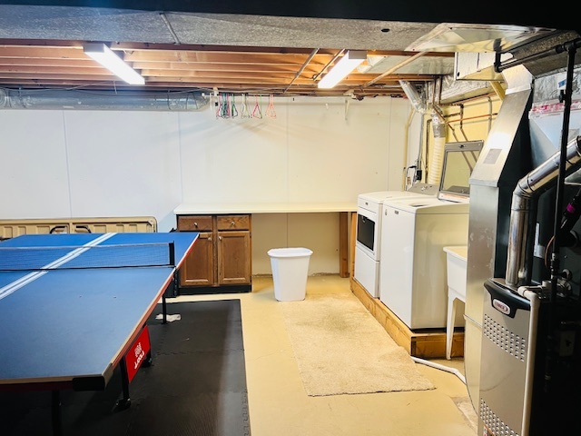 323 South Towanda Avenue, Unit 4 Normal, IL 61761 - Photo 26 of 33 a room with storage and utility