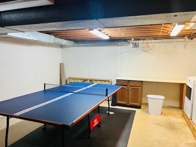 323 South Towanda Avenue, Unit 4 Normal, IL 61761 - Photo 27 of 33 a room with pool table and a table