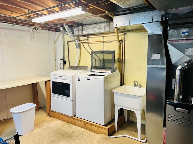 323 South Towanda Avenue, Unit 4 Normal, IL 61761 - Photo 28 of 33 a utility room with dryer and washer
