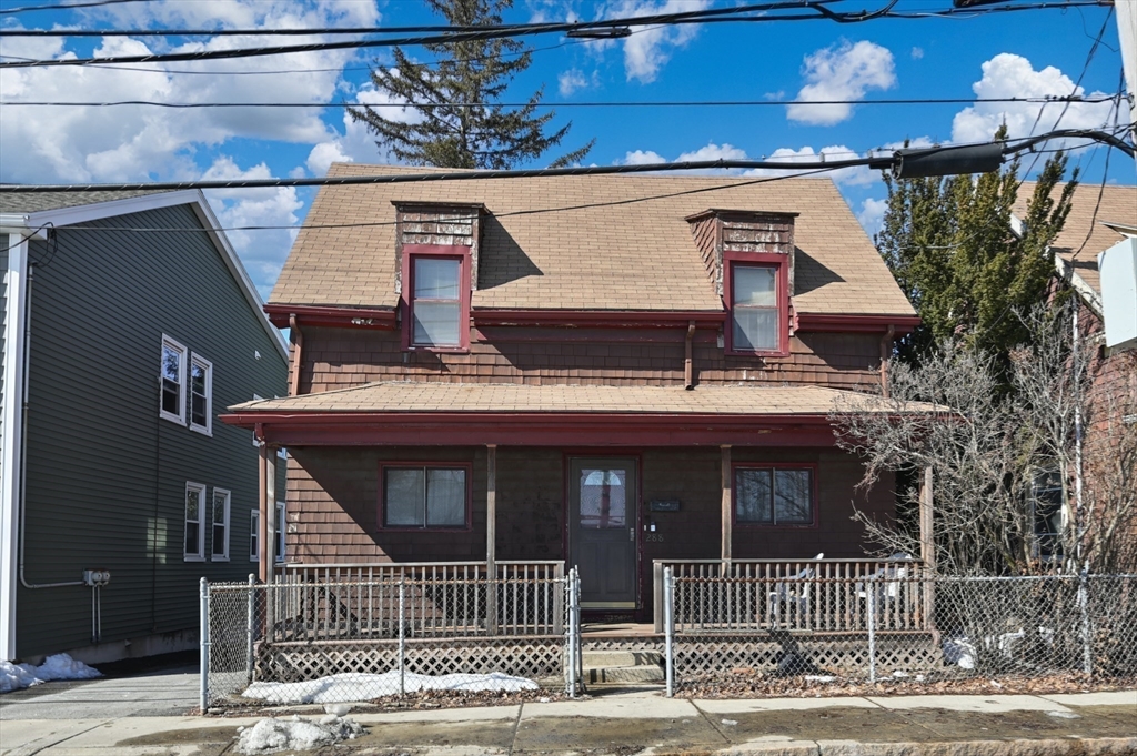 288 Cedar Street Somerville, MA 02145 - Photo 1 of 23 a front view of a house with a garage