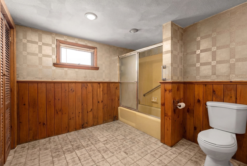 288 Cedar Street Somerville, MA 02145 - Photo 18 of 23 a bathroom with a toilet a sink and bathtub