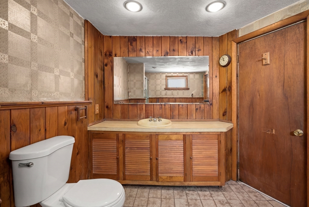 288 Cedar Street Somerville, MA 02145 - Photo 20 of 23 a bathroom with a sink a toilet and shower