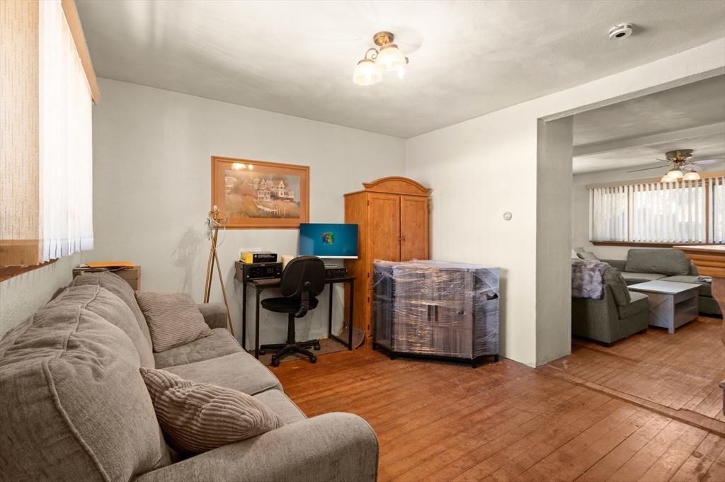 288 Cedar Street Somerville, MA 02145 - Photo 6 of 23 a living room with furniture and a flat screen tv
