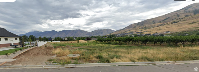 410 West 2100 South, Unit 4 Perry, UT 84302 - Photo 1 of 1 View of mountain background featuring rural landscape