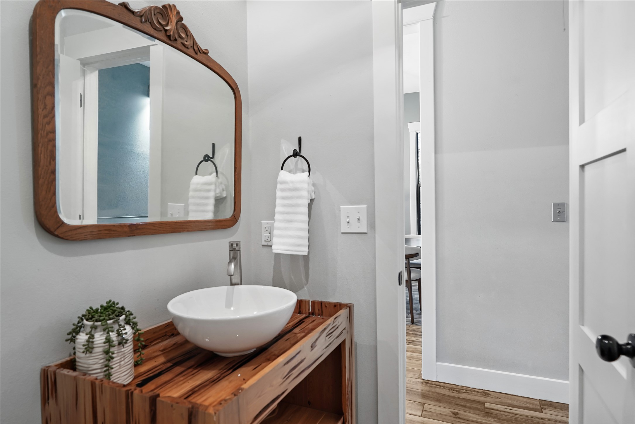 786 Beauchamp Road Dripping Springs, TX 78620 - Photo 15 of 40 Half bathroom across from dining room