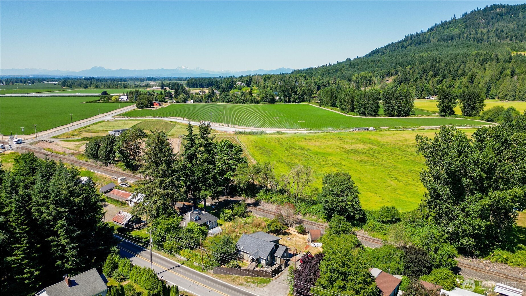 5942 Lawrence Road Everson, WA 98247 - Photo 3 of 40 a view of a city with a lake